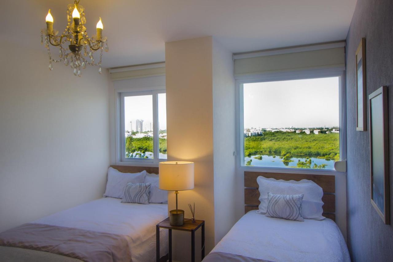 Tu Hogar Frente Al Mar Caribe, Vive Cancun Bagian luar foto